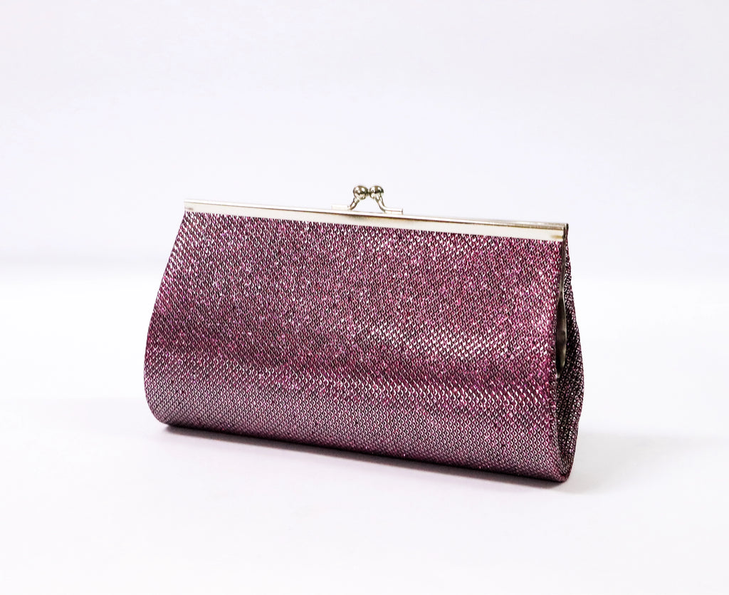 Cartera de fiesta broche